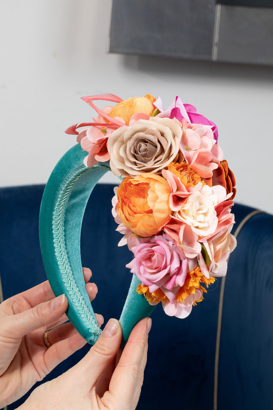 Mint green fascinator headband, padded velvet, peach blush orange cream flowers, feather headpiece